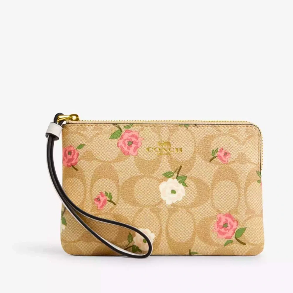 New with tag Coach Corner Zip Wristlet In Signature Canvas With Floral